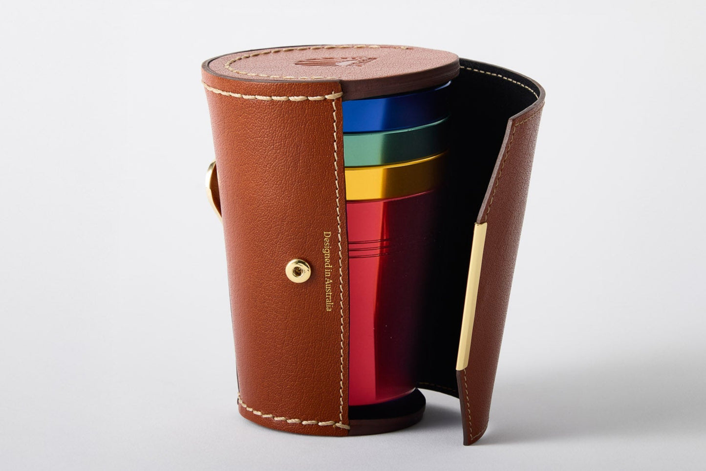 Set of 4 anodised aluminium cups stored in a premium leather case with gold opener – Maits
